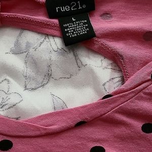 Pink and black polka dot shirt